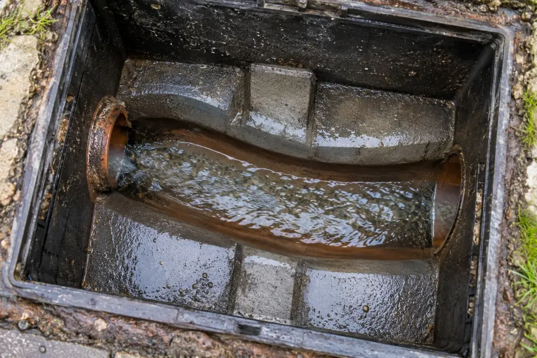 Clean drain channel with water flowing freely in an inspection chamber